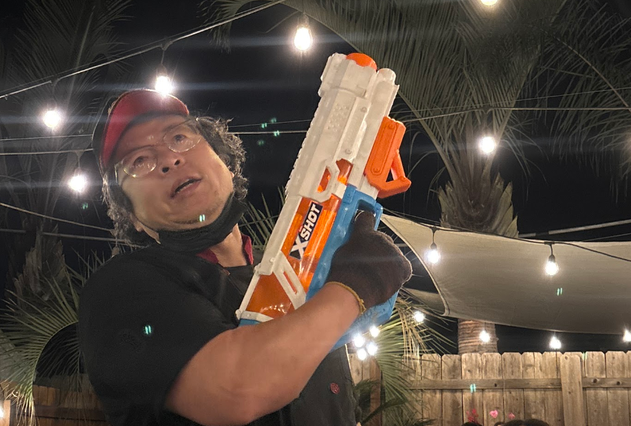 A tiny laptop in the palm of a hand